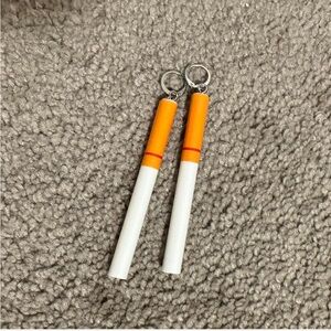 Fake cigarette huggie earrings